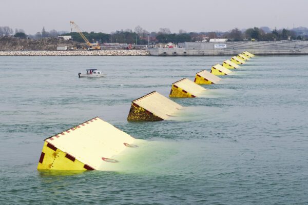 Blocks of the mobile gates of the Experimental Electromechanical Module (Mose), a project intended to protect Venice from floods, emerge during technical tests at the ‘Bocca di Porto’ at Venice’s Lido (Photo by LUCA_ZANON/Corbis via Getty Images)