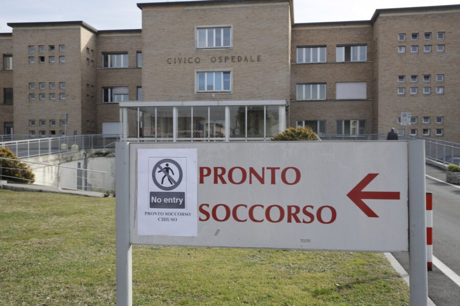 A sign attached on the indication for Emergency of the hospital of Codogno, near Lodi in Northern Italy, advises that access is not allowed Friday, Feb. 21,2020. Health officials reported the country’s first cases of contagion of COVID-19 in people who had not been in China. The hospital in Codogno is one of the hospitals – along with specialized Sacco Hospital in Milan – which is hosting the infected persons and the people that were in contact with them and are being isolated. (AP Photo/Luca Bruno)