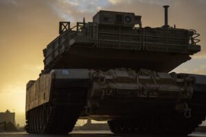 An M1A1 Abrams tank offloaded for DEFENDER-Europe 20 from the M/V Endurance, a contracted roll on, roll off vessel through Military Sealift Command, sits prepositioned on the pier at Bremerhaven port. Endurance transited more than 14,825 long tons of cargo equaling 1,254 pieces of equipment across the Atlantic for DEFENDER-Europe 20. DEFENDER-Europe 20 demonstrates and develops the extensive military capabilities that NATO allies need to prevent conflict, preserve peace and keep our nations safe.