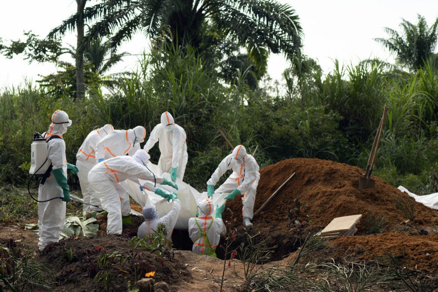 FILE – In this Sunday, July 14, 2019 file photo, an Ebola victim is put to rest at the Muslim cemetery in Beni, Congo. These African stories captured the world’s attention in 2019 – and look to influence events on the continent in 2020. (AP Photo/Jerome Delay, File)