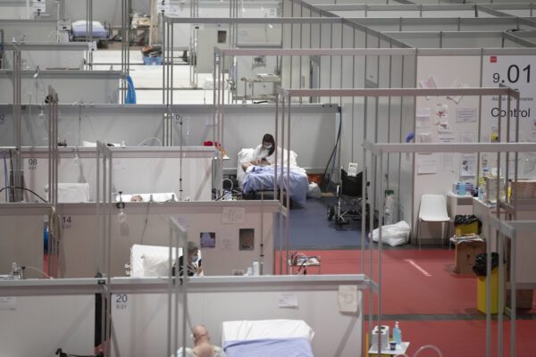 A view of a temporary field hospital set at Ifema convention and exhibition of in Madrid, Spain, Spain, Thursday, April 23, 2020, constructed to treat patients with coronavirus. (AP Photo/Manu Fernandez)