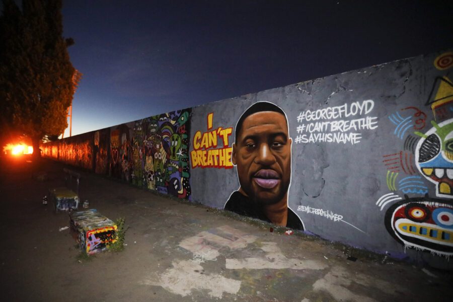 A graffiti by artist ‘EME Freethinker’ that depicts George Floyd is painted on a wall in the public park Mauerpark in Berlin, Germany, Friday, May 29, 2020. Floyd died after being restrained by Minneapolis police officers on Memorial Day, May 25, in the United States. (AP Photo/Markus Schreiber)