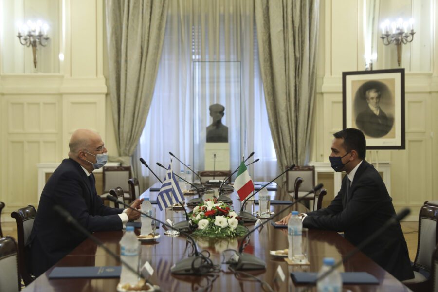 Greek Foreign Minister Nikos Dendias, left, meets with his Italian counterpart Luigi Di Maio at the Foreign Ministry in Athens, on Tuesday, June 9, 2020. (Costas Baltas /Pool via AP)