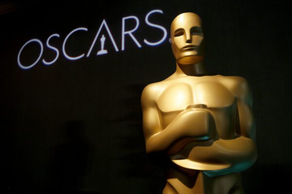 FILE – In this Feb. 4, 2019 file photo, an Oscar statue appears at the 91st Academy Awards Nominees Luncheon in Beverly Hills, Calif. The Academy of Motion Picture Arts and Sciences said Monday that the 93rd Academy Awards will now be held on April 25, 2021, eight weeks later than originally planned due to the pandemic’s effects on the movie industry. (Photo by Danny Moloshok/Invision/AP, File)