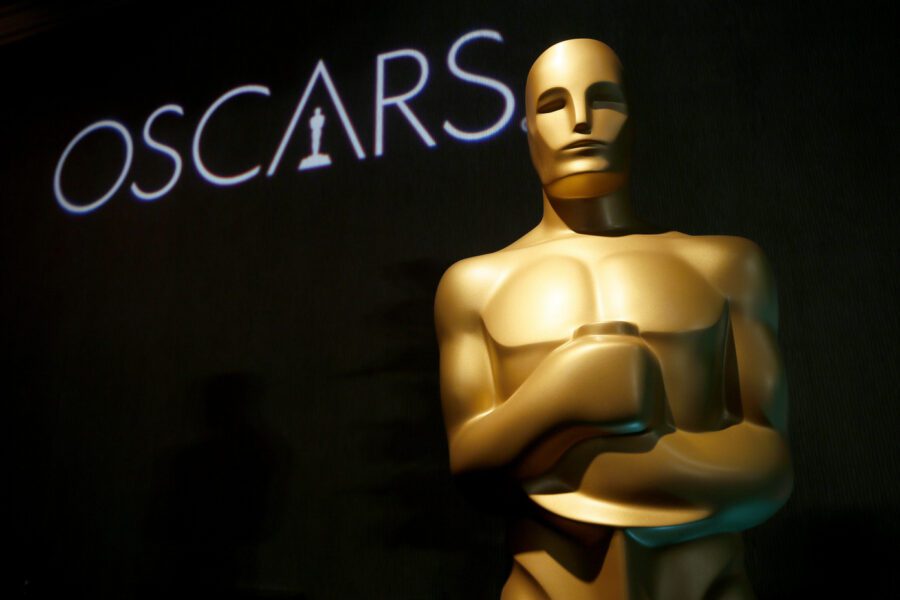 FILE – In this Feb. 4, 2019 file photo, an Oscar statue appears at the 91st Academy Awards Nominees Luncheon in Beverly Hills, Calif. The Academy of Motion Picture Arts and Sciences said Monday that the 93rd Academy Awards will now be held on April 25, 2021, eight weeks later than originally planned due to the pandemic’s effects on the movie industry. (Photo by Danny Moloshok/Invision/AP, File)