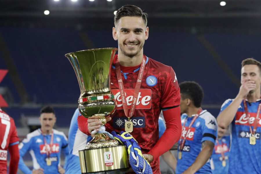 Napoli’s goalkeeper Alex Meret holds the Italian Cup trophy at the end of the final match between Napoli and Juventus, at Rome’s Olympic Stadium, Wednesday, June 17, 2020. (AP Photo/Andrew Medichini7