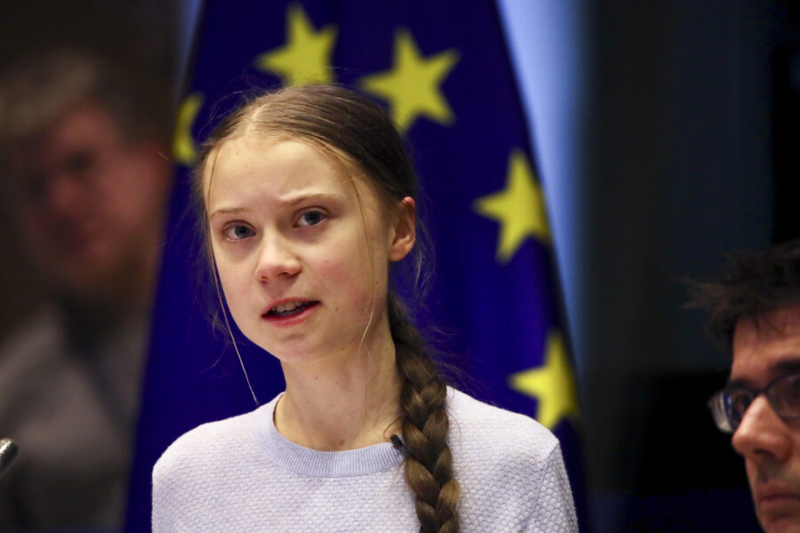 Swedish climate activist Greta Thunberg addresses a meeting of the Environment Council at the European Parliament in Brussels, Wednesday, March 4, 2020. Climate activists and Green members of the European Parliament are urging the European Union to be more ambitious as the bloc gets ready to unveil plans for a climate law to cut greenhouse gas emissions to zero by mid-century. (AP Photo/Olivier Matthys)