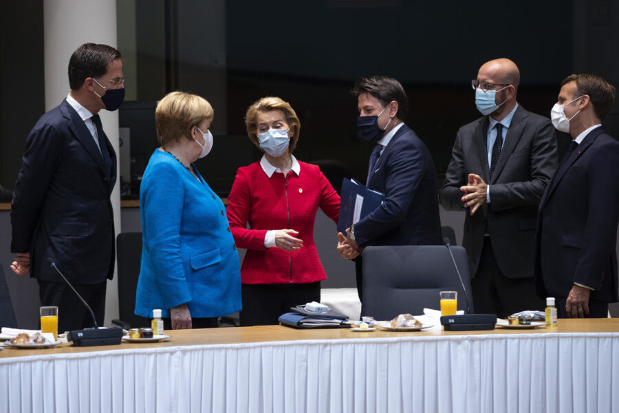 From left, Dutch Prime Minister Mark Rutte, German Chancellor Angela Merkel, European Commission President Ursula von der Leyen, Italy’s Prime Minister Giuseppe Conte, European Council President Charles Michel and French President Emmanuel Macron speak during a meeting on the sidelines of an EU summit in Brussels, Saturday, July 18, 2020. Leaders from 27 European Union nations meet face-to-face for a second day of an EU summit to assess an overall budget and recovery package spread over seven years estimated at some 1.75 trillion to 1.85 trillion euros. (AP Photo/Francisco Seco, Pool)