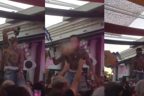 Follia in discoteca, dj beve da bottiglia e poi sputa sulla folla