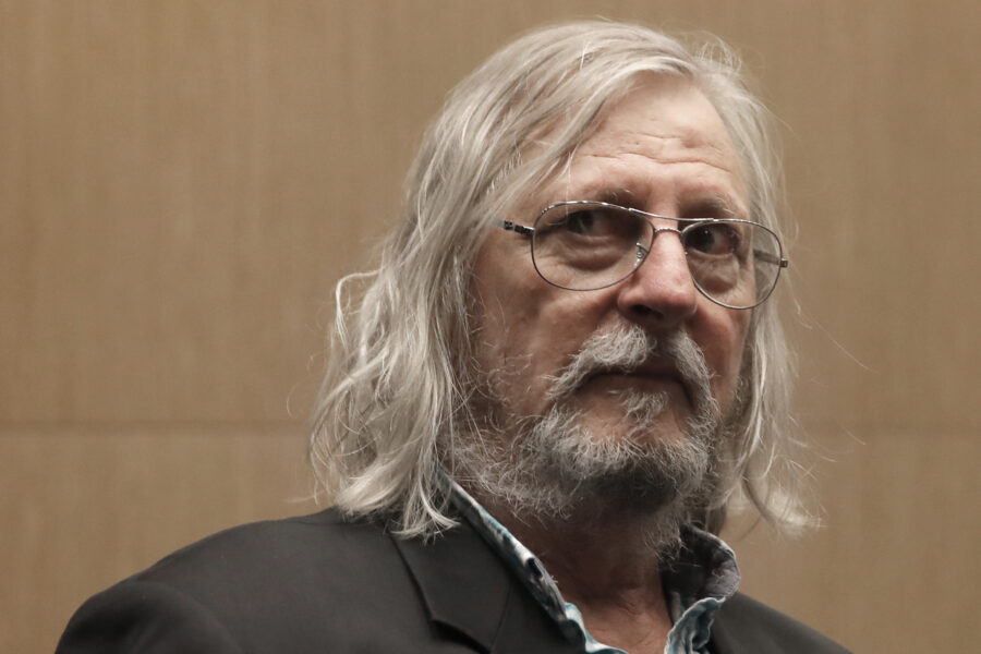 French virologist Dr. Didier Raoult, who has pushed aggressively for widespread use of anti-malaria drug hydroxychloroquine for virus patients, arrives before being questioned in a parliamentary inquiry into France’s management of the virus crisis, Wednesday, June 24, 2020 in Paris. Didier Raoult’s early research helped prompt U.S. President Donald Trump to champion the drug and French authorities to approve its use, though clinical trials have since found the drug wasn’t effective for hospitalized patients and can raise heart health risks. (AP Photo/Christophe Ena)