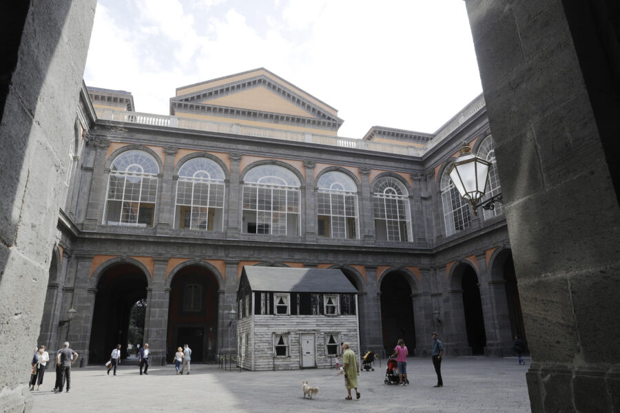 The house of U.S. civil rights campaigner Rosa Parks, rebuilt by artist Ryan Mendoza, is on display in Naples, Italy, Tuesday, Sept. 15, 2020. The rundown, paint-chipped Detroit house where Parks took refuge after her famous bus boycott is going on display in a setting that couldn’t be more incongruous: the imposing central courtyard of the 18th century Royal Palace. (AP Photo/Gregorio Borgia)