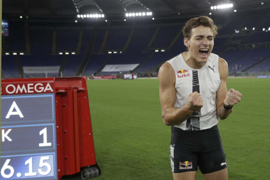 Sweden’s Armand Duplantis celebrates after jumping m. 6.15, the highest ever outdoor mark, during the men’s pole vault competition at the Golden Gala Pietro Mennea IAAF Diamond League athletics meet in Rome, Thursday, Sept. 17, 2020. (AP Photo/Gregorio Borgia)