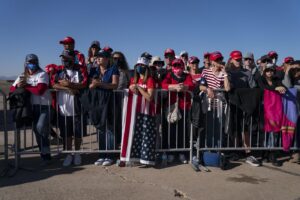 Supporters of President Donald Trump listen to him speak during a campaign rally at Phoenix Goodyear Airport, Wednesday, Oct. 28, 2020, in Goodyear, Ariz. (AP Photo/Evan Vucci)