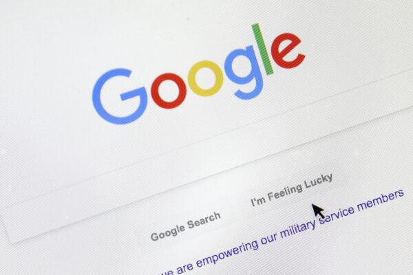 FILE – In this Aug. 28, 2018, file photo, a cursor moves over Google’s search engine page, in Portland, Ore. A French appeals court on Thursday, Oct. 8, 2020 upheld an order for Google to pay media companies to show their news content in search results. The Paris Court of Appeal rejected a challenge by the U.S. tech company, which had refused to comply with an order by France’s competition authority to negotiate with publishers and press agencies for payments to display their material. (AP Photo/Don Ryan, File)