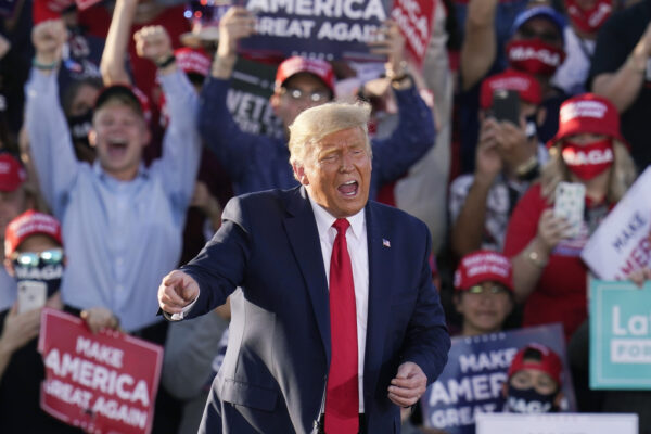 President Donald Trump works the crowd after speaking at a campaign rally Monday, Oct. 19, 2020, in Tucson, Ariz. (AP Photo/Ross D. Franklin)