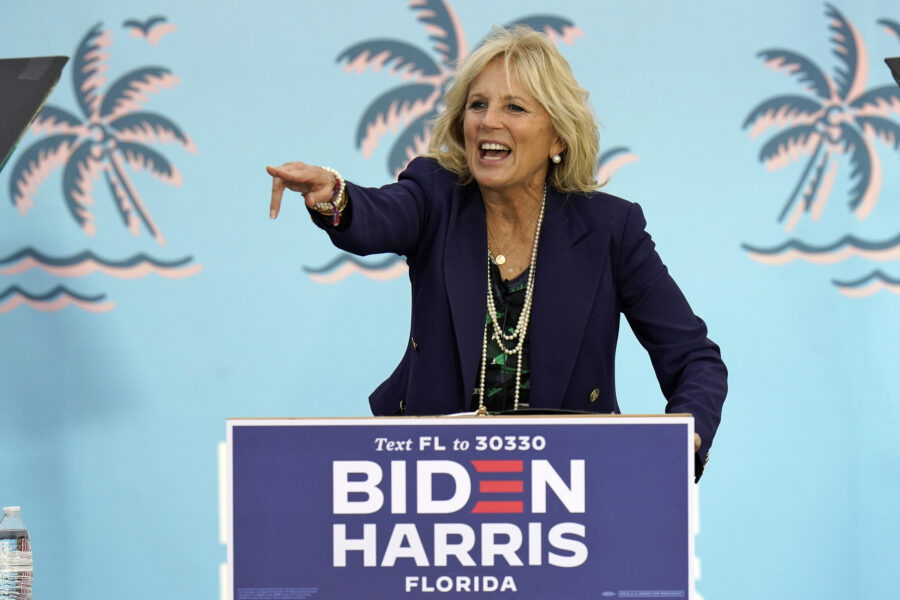 Jill Biden speaks to supporters while campaigning for her husband Democratic presidential candidate and former Vice President Joe Biden, during a drive in rally Sunday, Nov. 1, 2020, in Tampa, Fla. (AP Photo/Chris O’Meara)