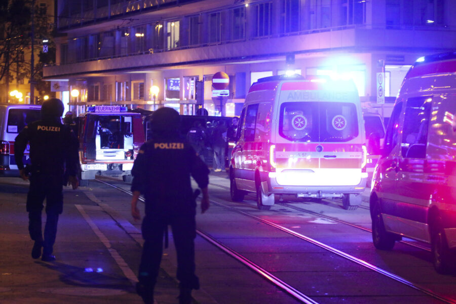A police officers walk near ambulances at the scene after gunshots were heard, in Vienna, Monday, Nov. 2, 2020. Austrian police say several people have been injured and officers are out in force following gunfire in the capital Vienna. Initial reports that a synagogue was the target of an attack couldn’t immediately be confirmed. Austrian news agency APA quoted the country’s Interior Ministry saying one attacker has been killed and another could be on the run.(Photo/Ronald Zak)
