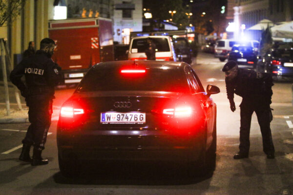 Police officers check a car at the scene after gunshots were heard, in Vienna, Monday, Nov. 2, 2020. Austrian police say several people have been injured and officers are out in force following gunfire in the capital Vienna. Initial reports that a synagogue was the target of an attack couldn’t immediately be confirmed. Austrian news agency APA quoted the country’s Interior Ministry saying one attacker has been killed and another could be on the run.(Photo/Ronald Zak)