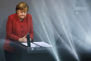 German Chancellor Angela Merkel delivers her speech during the debate about Germany’s budget 2021, at the parliament Bundestag in Berlin, Germany, Wednesday, Dec. 9, 2020. (AP Photo/Markus Schreiber)