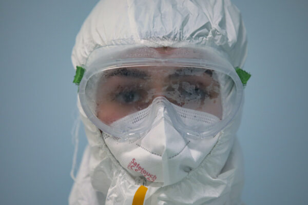 Nurse Ilknur Bastan’s goggles are covered with vapor after tending to patients infected with COVID-19, at the intensive care unit of the Dr Ilhan Varank Hospital in Istanbul, Saturday, Dec. 19, 2020. The hospital is a new infirmary offering some of the most advanced intensive care treatment in the country. When the pandemic first struck, Turkey was credited for quickly bringing infection rates under control. It is now seeing an explosion in COVID-19 cases that is putting a serious strain on its health system.(AP Photo/Emrah Gurel)