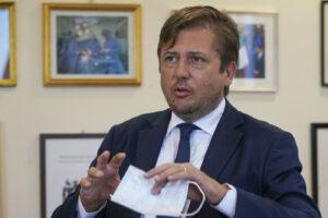 Deputy Minister of Health Pierpaolo Sileri talks during an interview with the Associated Press, in Rome, Wednesday, Aug. 26, 2020. Sileri said that widespread swab-testing and flexibility to quickly shutdown classes or schools with clusters is the key to school reopening. (AP Photo/Andrew Medichini)