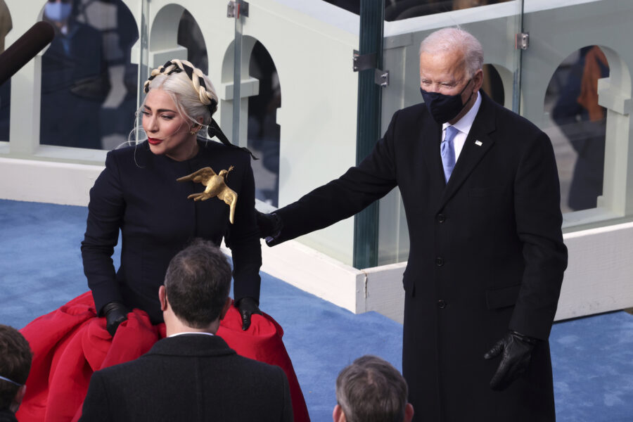 Lady Gaga reacts with President-elect Joe Biden after singing the National Anthem at Biden’s inauguration on the West Front of the U.S. Capitol on Wednesday, Jan. 20, 2021 in Washington. ( Tasos Katopodis/Pool Photo via AP)
