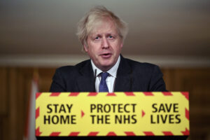 Britain’s Prime Minister Boris Johnson speaks during a coronavirus press conference at 10 Downing Street in London, Friday Jan. 22, 2021.  Johnson announced that the new variant of COVID-19, which was first discovered in the south of England, may be linked with an increase in the mortality rate. (Leon Neal/Pool via AP)
