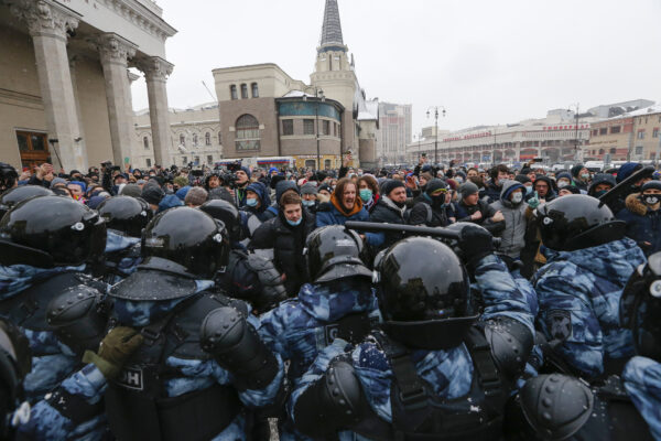 People clash with police during a protest against the jailing of opposition leader Alexei Navalny in Moscow, Russia, Sunday, Jan. 31, 2021. Thousands of people took to the streets Sunday across Russia to demand the release of jailed opposition leader Alexei Navalny, keeping up the wave of nationwide protests that have rattled the Kremlin. Hundreds were detained by police. (AP Photo/Alexander Zemlianichenko)
People clash with police during a protest against the jailing of opposition leader Alexei Navalny in Moscow, Russia, on Sunday, Jan. 31, 2021. Thousands of people took to the streets Sunday across Russia to demand the release of jailed opposition leader Alexei Navalny, keeping up the wave of nationwide protests that have rattled the Kremlin. Hundreds were detained by police. (AP Photo/Alexander Zemlianichenko) People clash with police during a protest against the jailing of opposition leader Alexei Navalny in Moscow, Russia, Sunday, Jan. 31, 2021. Thousands of people took to the streets Sunday across Russia to demand the release of jailed opposition leader Alexei Navalny, keeping up the wave of nationwide protests that have rattled the Kremlin. Hundreds were detained by police. (AP Photo/Alexander Zemlianichenko)
People clash with police during a protest against the jailing of opposition leader Alexei Navalny in Moscow, Russia, on Sunday, Jan. 31, 2021. Thousands of people took to the streets Sunday across Russia to demand the release of jailed opposition leader Alexei Navalny, keeping up the wave of nationwide protests that have rattled the Kremlin. Hundreds were detained by police. (AP Photo/Alexander Zemlianichenko)