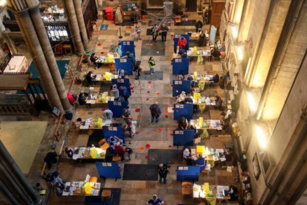 Cubicles erected inside Salisbury Cathedral, for people to receive a dose of the Pfizer-BioNTech coronavirus vaccine, in Salisbury, England,   Saturday, Jan. 16, 2021, before being administered to members of the public. The historic site is acting as a venue for the Sarum South Primary Care Network COVID-19 Local Vaccination Service. (Steve Parsons/PA via AP)