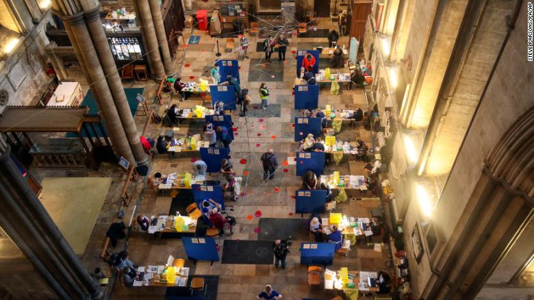 Cubicles erected inside Salisbury Cathedral, for people to receive a dose of the Pfizer-BioNTech coronavirus vaccine, in Salisbury, England,   Saturday, Jan. 16, 2021, before being administered to members of the public. The historic site is acting as a venue for the Sarum South Primary Care Network COVID-19 Local Vaccination Service. (Steve Parsons/PA via AP)