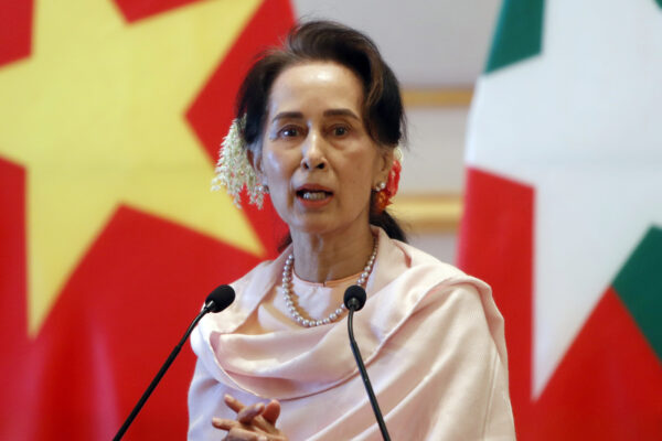 FILE – In this Dec. 17, 2019, file photo, Myanmar’s leader Aung San Suu Kyi speaks during a joint press conference with Vietnam’s Prime Minister Nguyen Xuan Phuc after their meeting at the Presidential Palace in Naypyitaw, Myanmar. Reports says Monday, Feb. 1, 2021 a military coup has taken place in Myanmar and Suu Kyi has been detained under house arrest. (AP Photo/Aung Shine Oo, File)
