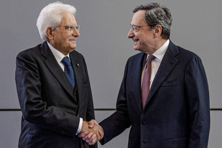 FILE– Italy’s President Sergio Mattarella, left, welcomes reigning European Central Bank President Mario Draghi on the eve of the change at the head of the ECB in Frankfurt, Germany, Monday, Oct. 28, 2019. Italian President Sergio Mattarella has summoned Tuesday, Feb. 2, 2021, former European Central Bank President Mario Draghi at the Quirinale Presidential Palace on Wednesday for talks, after two rounds of talks failed to seal an agreement among parties on a new premiership for the outgoing Giuseppe Conte. (Boris Roessler/Pool Photo via AP)