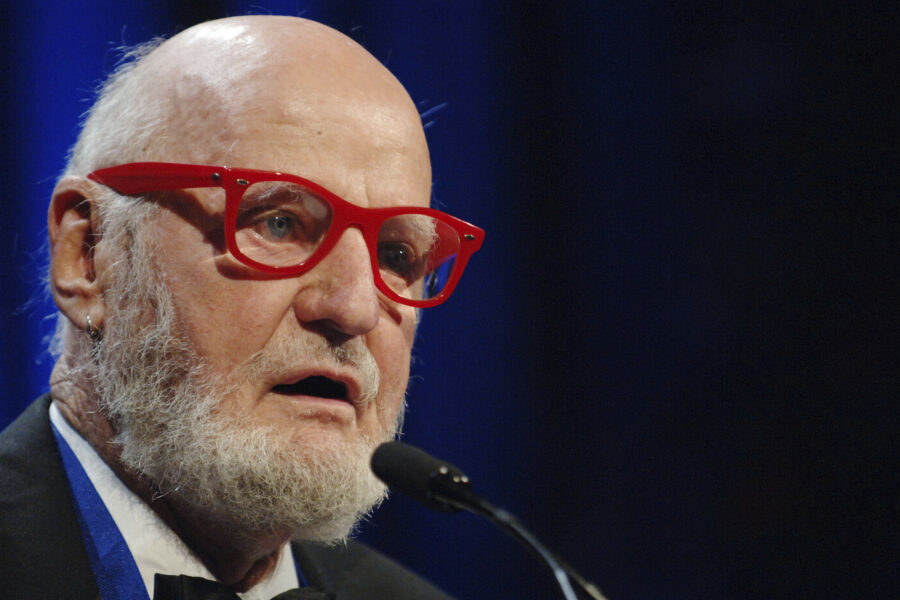 FILE – Author Lawrence Ferlinghetti recites a poem after he was awarded the Literarian Award for Outstanding Service to the American Literary Community at the National Book Awards in New York, on Nov. 16, 2005. Ferlinghetti, a poet, publisher and bookseller has died in San Francisco at age 101. His son says Ferlinghetti died at home on Monday, Feb. 22, 2021. Ferlinghetti helped launch and perpetuate the Beat movement. He was known for his City Lights bookstore in San Francisco, an essential meeting place for the Beats and other bohemians in the 1950s and beyond. (AP Photo/Henny Ray Abrams, File)