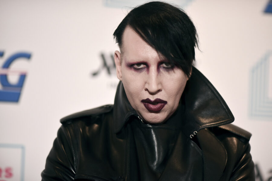 FILE – Marilyn Manson attends the 9th annual "Home for the Holidays" benefit concert on Dec. 10, 2019, in Los Angeles. Manson was dropped by his record label Monday after his ex-fiancé, the actor Evan Rachel Wood, accused him of sexual and other physical abuse. (Photo by Richard Shotwell/Invision/AP, File)
