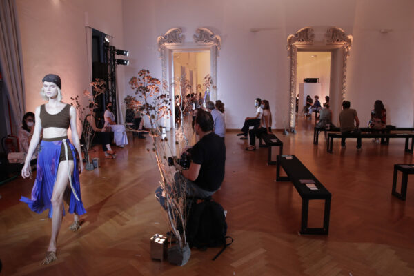 Respecting the social distances and wearing masks to protect against COVID-19 people look at Caterina Moro’s show, part of the 2021 spring-summer collections presented during the Altaroma fashion shows in Rome, Thursday, Sep. 17, 2020. The COVID-19 pandemic has forced many fashion brands to rethink the way they will show their collections. (AP Photo/Alessandra Tarantino) Respecting the social distances and wearing masks to protect against COVID-19 people look at Caterina Moro’s show, part of the 2021 spring-summer collections presented during the Altaroma fashion shows in Rome, Thursday, Sep. 17, 2020. The COVID-19 pandemic has forced many fashion brands to rethink the way they will show their collections. (AP Photo/Alessandra Tarantino)