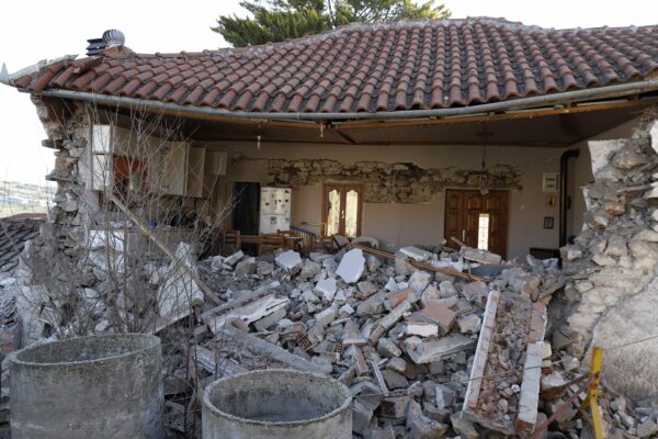 A damaged house is seen after an earthquake in Damasi village, central Greece, Thursday, March 4, 2021. Fearful of returning to their homes, thousands of people in central Greece spent the night outdoors after a powerful earthquake, felt across the region, damaged homes and public buildings. (AP Photo/Vaggelis Kousioras)