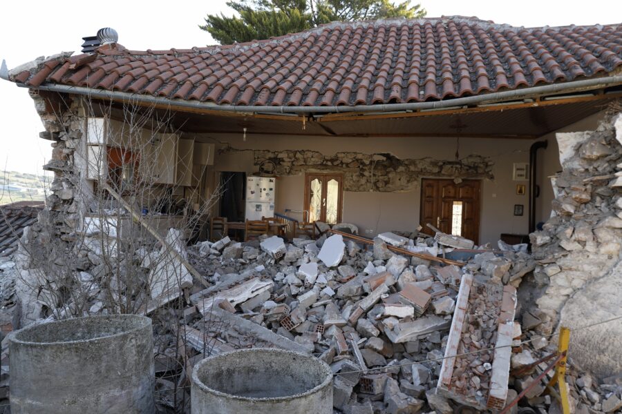 A damaged house is seen after an earthquake in Damasi village, central Greece, Thursday, March 4, 2021. Fearful of returning to their homes, thousands of people in central Greece spent the night outdoors after a powerful earthquake, felt across the region, damaged homes and public buildings. (AP Photo/Vaggelis Kousioras)