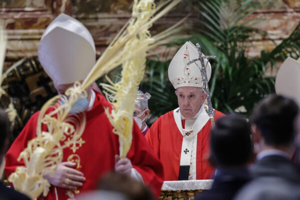Pope Francis celebrates Palm Sunday Mass in Saint Peter’s Basilica at the Vatican, Sunday, March 28, 2021. (Giuseppe Lami/Pool photo via AP)