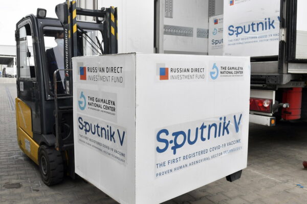 Boxes of Sputnik V vaccines are unloaded from a truck at a warehouse of Hungaropharma, a Hungarian pharmaceutical wholesale company, in Budapest, Hungary, Thursday, March 4, 2021. (Zoltan Mathe/MTI via AP)