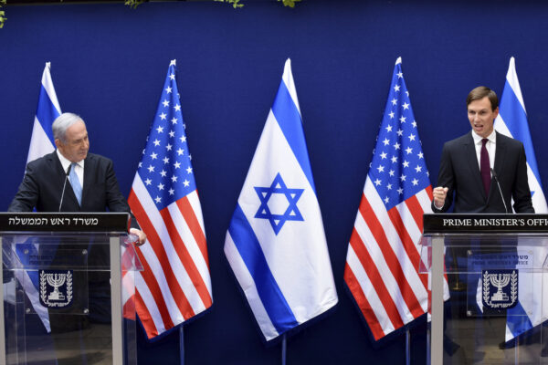 Israeli Prime Minister Benjamin Netanyahu, left, and White House adviser Jared Kushner make joint statements to the press about the Israeli-United Arab Emirates peace accords, in Jerusalem, Sunday, Aug. 30, 2020. Kushner is trumpeting the recent agreement by Israel and the United Arab Emirates to establish diplomatic relations as a historic breakthrough and said “the stage is set” for other Arab states to follow suit. (Debbie Hill/Pool Photo via AP)
