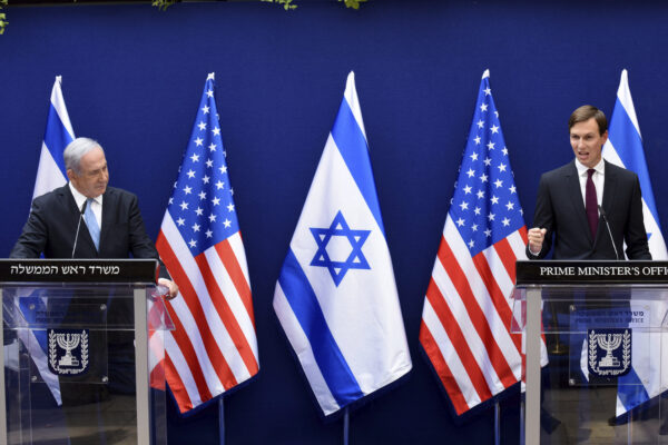 Israeli Prime Minister Benjamin Netanyahu, left, and White House adviser Jared Kushner make joint statements to the press about the Israeli-United Arab Emirates peace accords, in Jerusalem, Sunday, Aug. 30, 2020. Kushner is trumpeting the recent agreement by Israel and the United Arab Emirates to establish diplomatic relations as a historic breakthrough and said “the stage is set” for other Arab states to follow suit. (Debbie Hill/Pool Photo via AP)