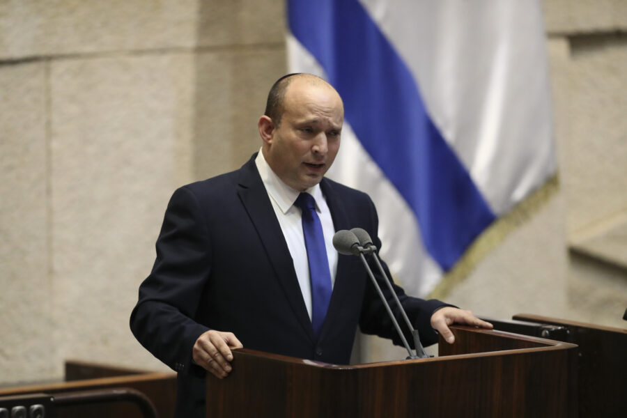Israel’s designated new prime minister, Naftali Bennett speaks during a Knesset session in Jerusalem Sunday, June 13, 2021. Bennett is expected later Sunday to be sworn in as the country’s new prime minister, ending Prime Minister Benjamin Netanyahu’s 12-year rule. (AP Photo/Ariel Schalit)