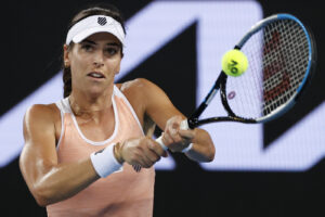 Australia’s Ajla Tomljanovic makes a backhand return to Romania’s Simona Halep during their second round match at the Australian Open tennis championship in Melbourne, Australia, Wednesday, Feb. 10, 2021.(AP Photo/Rick Rycroft)
