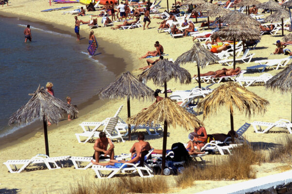 GREECE. CICLADI. 
IOS
MYLOPOTAS. UMBRELLAS ON THE BEACH