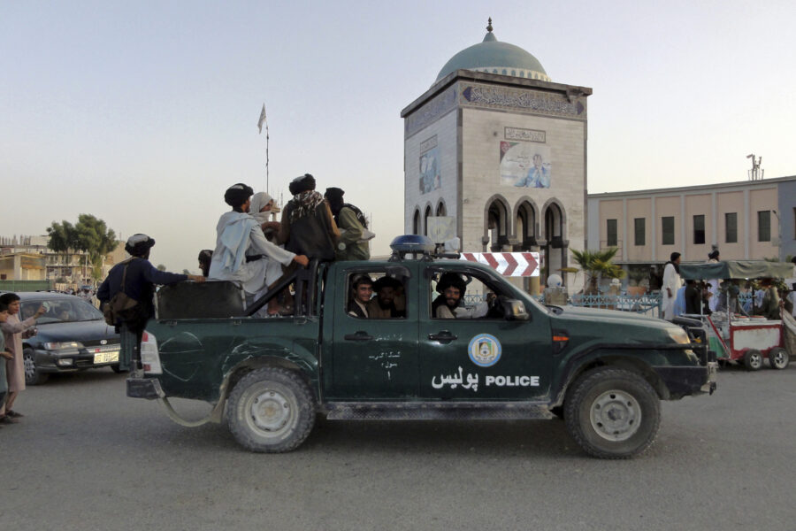 Taliban fighters patrol inside the city of Kandahar, southwest Afghanistan, Sunday, Aug. 15, 2021. (AP Photo/Sidiqullah Khan)