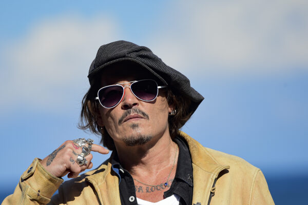 FILE – In this file photo dated Sunday, Sept. 20, 2020, US actor and film producer Johnny Deep during the photocall for his film “Crock of Gold: A Few Rounds with Shane Macgoman” at the 68th San Sebastian Film Festival, in San Sebastian, northern Spain. Appeal judges said the Hollywood star cannot challenge the High Court’s rejection of his libel lawsuit against publisher of The Sun newspaper for labeling him a “wife beater” in an article. High Court Justice Andrew Nicol ruled in November that allegations against Depp, made in a April 2018 article, were “substantially true.” The judges said Thursday that the earlier court hearing was “full and fair” and the justice’s conclusions “have not been shown even arguably to be vitiated by any error of  approach or mistake of law.” (AP Photo/Alvaro Barrientos, File)