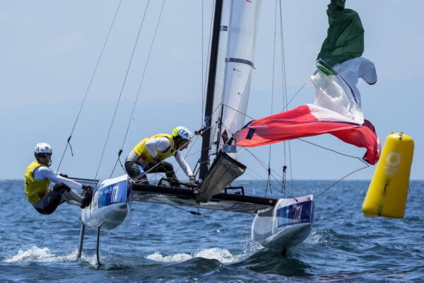 Italy’s Ruggero Tita and Caterina Banti compete during the Nacra race at the Enoshima harbour during the 2020 Summer Olympics, Sunday, Aug. 1, 2021, in Fujisawa, Japan. (AP Photo/Bernat Armangue)