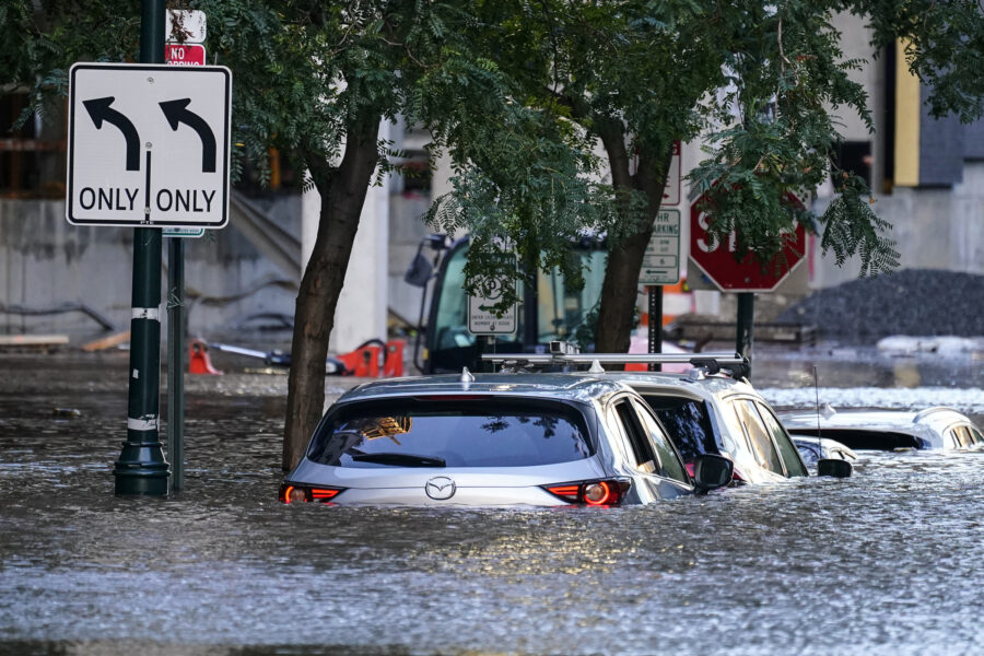 Vehicles are under water during flooding in Philadelphia, Thursday, Sept. 2, 2021 in the aftermath of downpours and high winds from the remnants of Hurricane Ida that hit the area. (AP Photo/Matt Rourke)