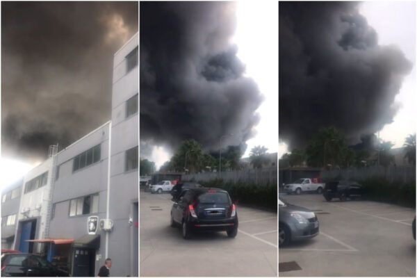 Capannone in fiamme, nube nera invade le città: incendio in una ditta