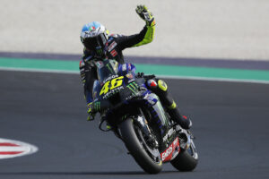 Yamaha rider Valentino Rossi, of Italy, waves his fans at the end of the qualifying session for Sunday’s Emilia Romagna Motorcycle Grand Prix at the Misano circuit in Misano Adriatico, Italy, Saturday, Sept. 19, 2020. (AP Photo/Antonio Calanni) Yamaha rider Valentino Rossi, of Italy, waves his fans at the end of the qualifying session for Sunday’s Emilia Romagna Motorcycle Grand Prix at the Misano circuit in Misano Adriatico, Italy, Saturday, Sept. 19, 2020. (AP Photo/Antonio Calanni)